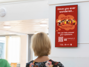 Image of a digital screen in hospitals with council foster campaign