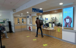 Image of a D6 advertising screen in Royal Lancaster hospital