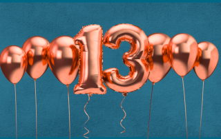 Image of orange balloon bunch and feature 13 balloons on blue background