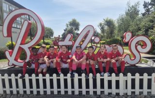 Ebbsfleet United Whites U10s team in front of the Butlins sign at ESF26 Tournament