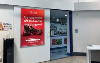 Image of British Heart Foundation campaign on poster advert in hospital