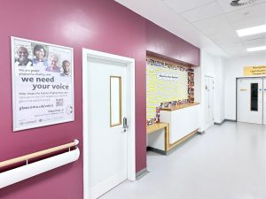 Image of a poster with Glaucoma UK campaign in hospital corridor