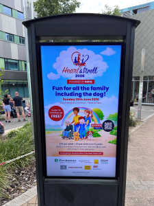 Image of a digital screen promoting the Heart & Stroll 2026 event