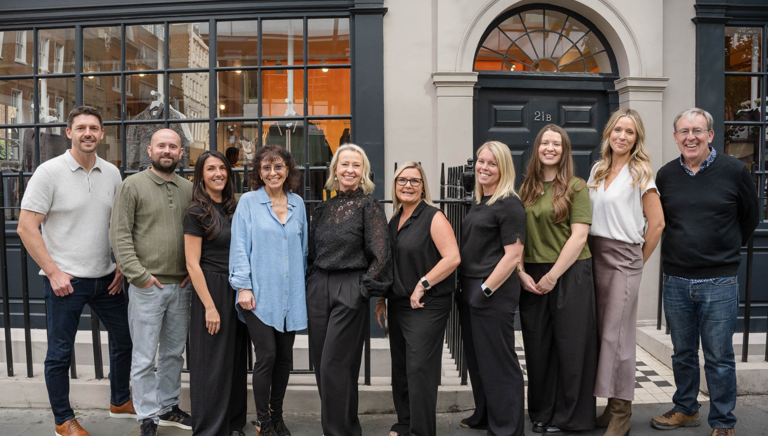 Photo of Pulse Outdoor Media team standing outside office in London