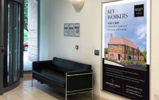 Image of Wyatt Homes advert in hospital entrance